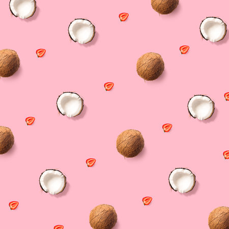 Seamless pattern with coconuts and strawberry on a pink background.