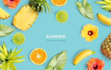 Summer background with tropical fruits. Flat lay, top view, copy spaceの写真素材