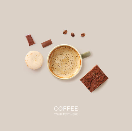 Coffee cup with coffee beans and chocolate bars on gray background.の写真素材