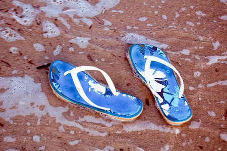 Summer shoes on the sand