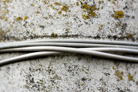 Background of metal wire and concrete surfacesの写真素材