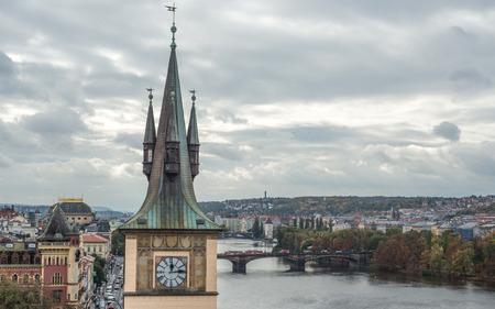 Prague, Czech Republic - October 10, 2017: Close up view on ancient Old Town Water Tower and Vltava river, Prague, Czech Republic. Staromestska vodarna.の写真素材