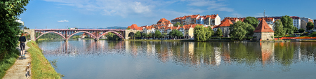 Maribor, Slovenia - May 20, 2018: Panorama of Maribor city, Slovenia. Drava River, old buildings and mountains of Maribor city center.のeditorial素材