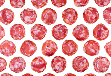 Salami sausage slices background. Close up. Slices of smoked sausage. Food background.の写真素材