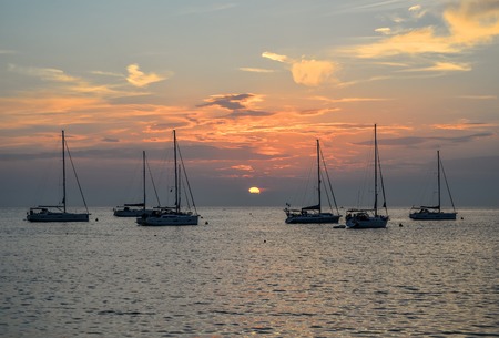 Rovinj, Croatia - May 21, 2018: Evening view on Yachts, fishing boats and the Adriatic sunset sea, Rovinj, Croatiaの写真素材