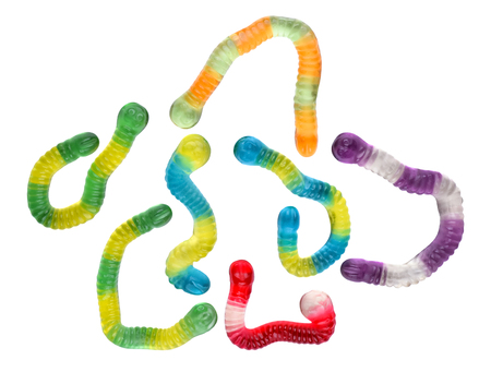 Colorful jelly worms isolated on white. Sweet gummy worms set isolated on white, close up, top viewの写真素材