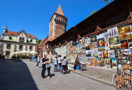Krakow, Poland - May 20, 2019: Outdoor gallery on the city walls of Krakow. This famous street gallery is located on the city walls at St. Florian Gate, the focal point of Krakow old town.のeditorial素材