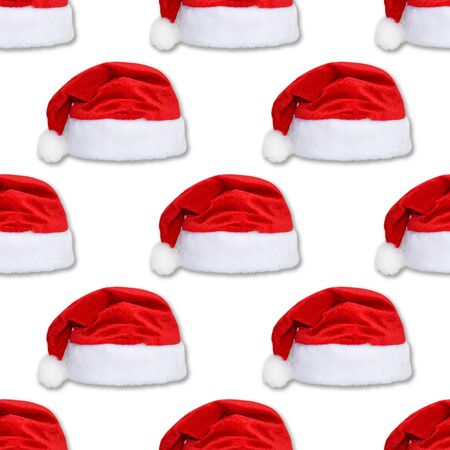 Santa Claus red hat isolated on white background. Red christmas hat or cap seamless new year patternの写真素材