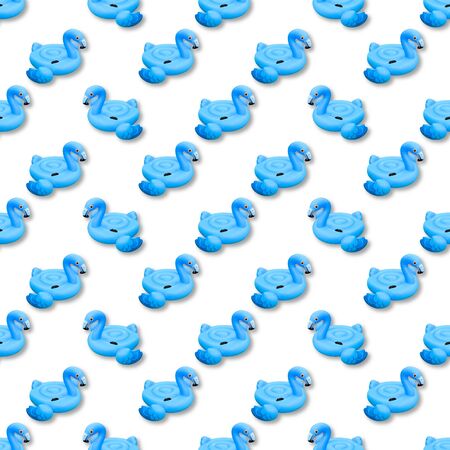 Blue flamingo isolated on background. Swimming pool toy in shape of blue flamingo seamless pattern. Flamingo inflatable cut out. Top view, flat lay.の写真素材