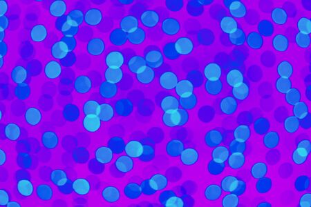 Blue and violet Blurred lights background. Defocused glitter background