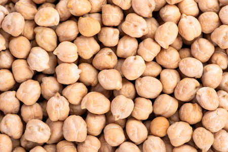 Chickpeas background close up. Healthy vegan food concept. Top view banner with Chickpeas close upの写真素材