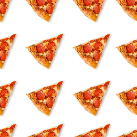 Seamless slice or piece of pizza pattern isolated on white background. Top view on paperoni pizza food background.の写真素材
