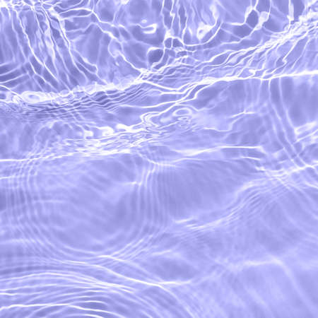 The surface of light on the purple transparent swimming pool water. Abstract wavy background. Water waves in sunlight banner. Square Trendy banner with 2022 color of the year very periの写真素材