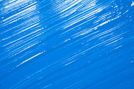 Background or texture of glossy blue paint. Acrylic blue paint abstract texture or painting for your banner or posterの写真素材