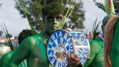 Estarreja, Portugal - 13.02.2024: Traditional winter annual Estarreja samba carnival in Portugal. Costume music dance festival for adults. Close up on group of musicians in costumes or orchestraのeditorial素材