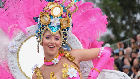 Estarreja, Portugal - 13.02.2024: Traditional winter annual Estarreja samba carnival in Portugal. Costume music dance festival for adults samba dance. Close up on women dancing sambaのeditorial素材