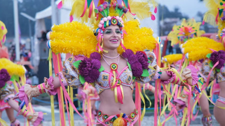 Estarreja, Portugal - 13.02.2024: Traditional winter annual Estarreja samba carnival in Portugal. Costume music dance festival for adults samba dance. Close up on women dancing sambaのeditorial素材