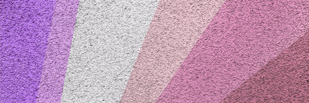 A textured abstract background featuring diagonal color stripes in shades of pink, violet, lavender,...