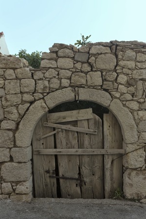 Old antique door in croatia in podgoraの写真素材
