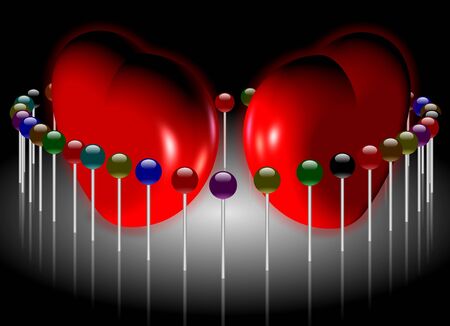 two red hearts surrounded by colorful pins under spotlightの写真素材