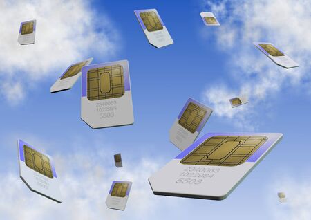 a number of sim cards falling from the skyの写真素材