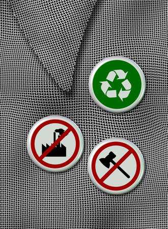 three environmental badges pinned on a black and white shirtの写真素材