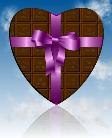a piece of chocolate shaped as heart and wrapped with a pink ribbonの写真素材