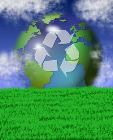 green grass field and blue sky with recycle symbol on earth in the backgroundの写真素材