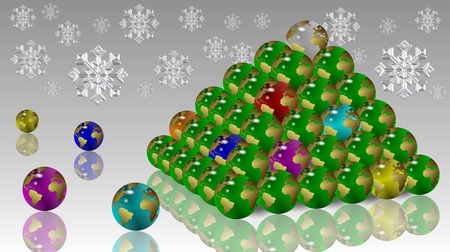 Christmas tree shape made from earth globes with snowflakes in the backgroundの写真素材