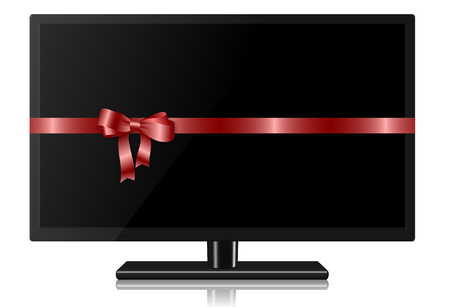 Widescreen TV wrapped with a red silk ribbonの写真素材