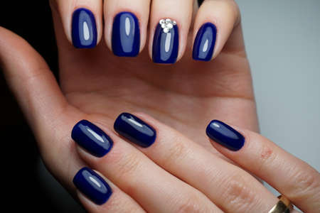 Natural nails with clean manicure.の写真素材