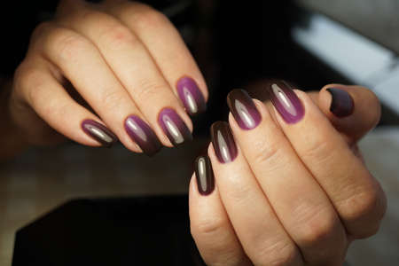 Awesome nails and beautiful clean manicure. Nails are natural. Manicure is made using nails drill machine.の写真素材