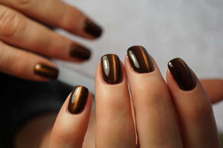 Awesome nails and beautiful clean manicure. Nails are natural. Manicure is made using nails drill machine.の写真素材