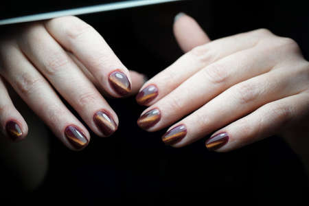 Awesome nails and beautiful clean manicure. Nails are natural. Manicure is made using nails drill machine.の写真素材