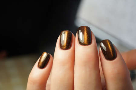 Awesome nails and beautiful clean manicure. Nails are natural. Manicure is made using nails drill machine.の写真素材