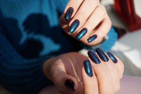 Awesome nails and beautiful clean manicure. Nails are natural. Manicure is made using nails drill machine.の写真素材