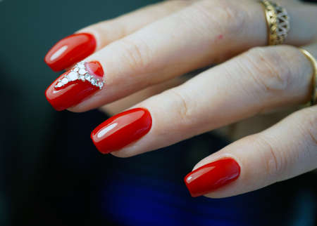 Awesome nails and beautiful clean manicure. Nails are natural. Manicure is made using nails drill machine.の写真素材