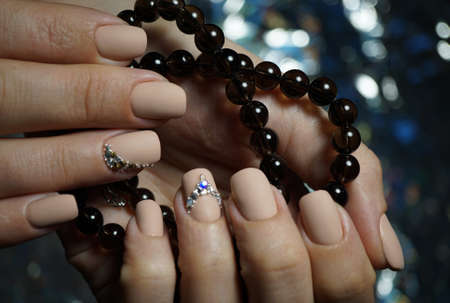 Awesome nails and beautiful clean manicure. Nails are natural. Manicure is made using nails drill machine.の写真素材