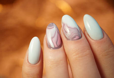 Awesome nails and beautiful clean manicure. Nails are natural. Manicure is made using nails drill machine.の写真素材