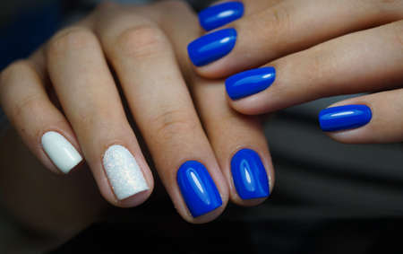 Awesome nails and beautiful clean manicure. Nails are natural. Manicure is made using nails drill machine.の写真素材