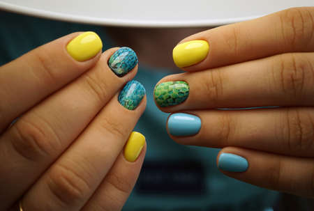 Awesome nails and beautiful clean manicure. Nails are natural. Manicure is made using nails drill machine.の写真素材