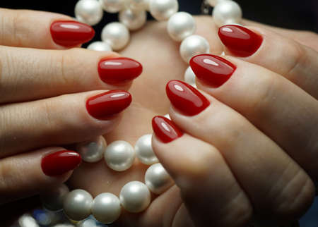 Awesome nails and beautiful clean manicure. Nails are natural. Manicure is made using nails drill machine.の写真素材