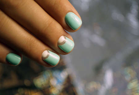 Awesome nails and beautiful clean manicure. Nails are natural. Manicure is made using nails drill machine.の写真素材