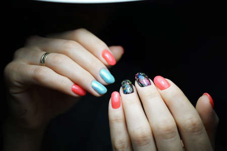 Awesome nails and beautiful clean manicure. Nails are natural. Manicure is made using nails drill machine.の写真素材