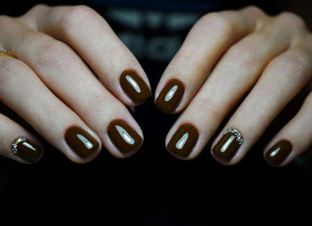 Awesome nails and beautiful clean manicure. Nails are natural. Manicure is made using nails drill machine.の写真素材