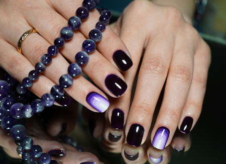 Awesome nails and beautiful clean manicure. Nails are natural. Manicure is made using nails drill machine.の写真素材