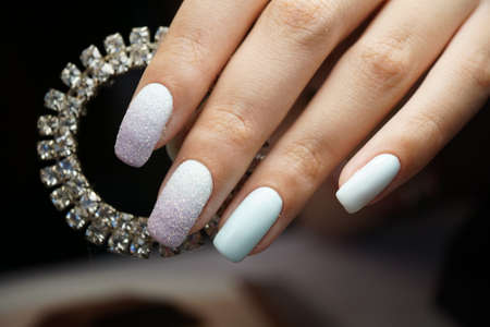 Awesome nails and beautiful clean manicure. Nails are natural. Manicure is made using nails drill machine.の写真素材