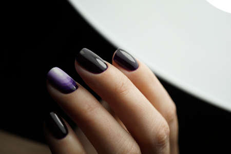 Awesome nails and beautiful clean manicure. Nails are natural. Manicure is made using nails drill machine.の写真素材