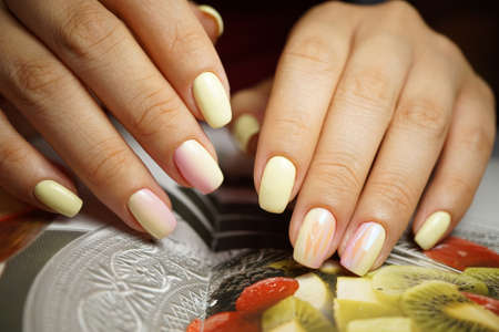 Awesome nails and beautiful clean manicure. Nails are natural. Manicure is made using nails drill machine.の写真素材