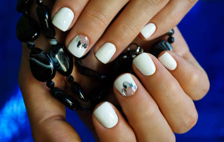 Awesome nails and beautiful clean manicure. Nails are natural. Manicure is made using nails drill machine.の写真素材